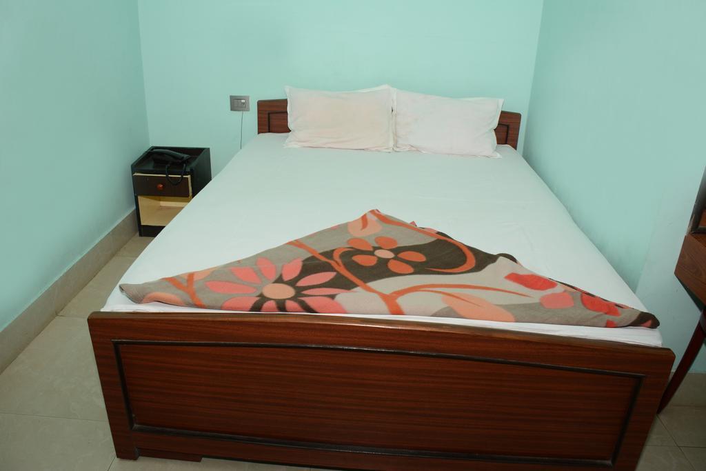 Hotel Nirmal Inn Bhubaneswar Værelse billede